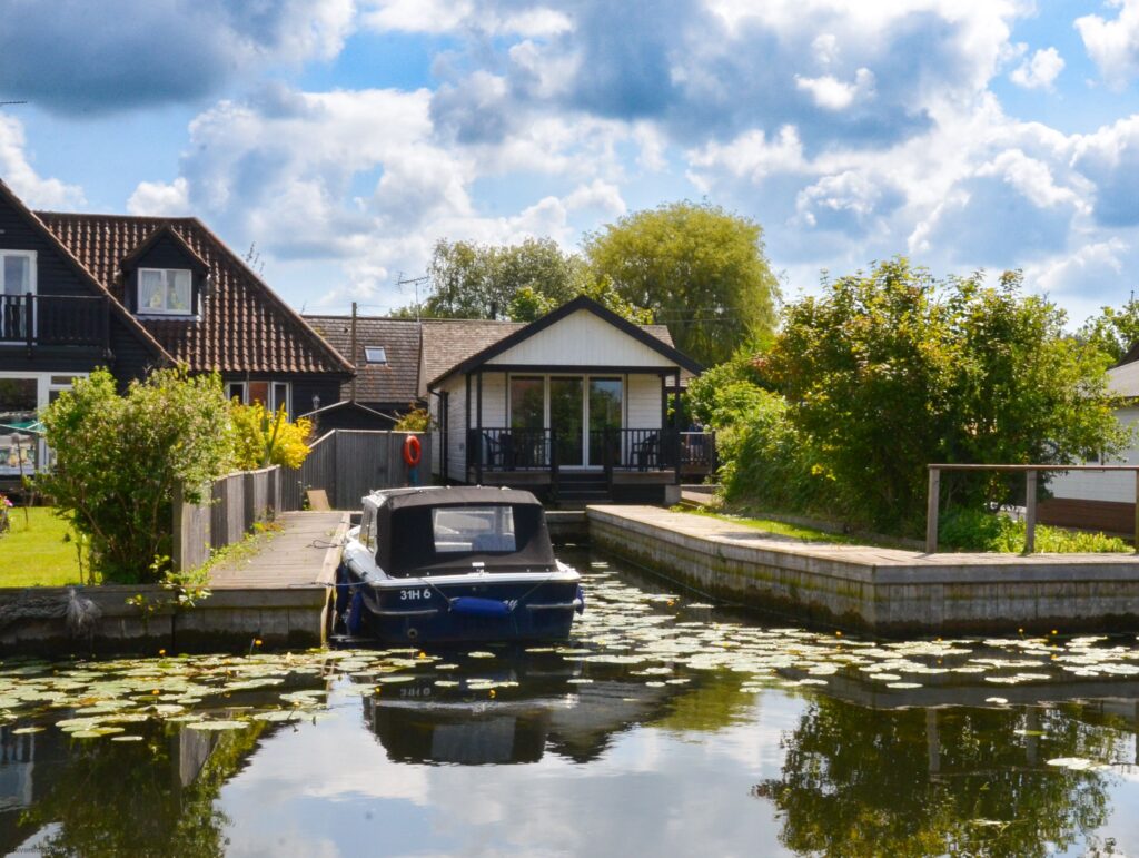 The Firs holiday cottage in Wroxham, Norfolk, offering charming riverside accommodation.